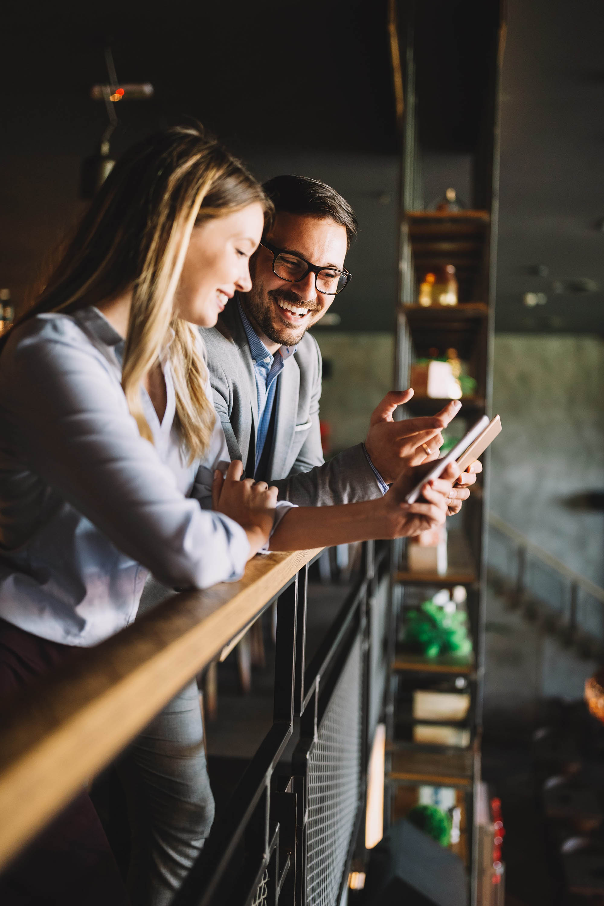 woman and man laughing colleagues at unique by atlantic hotels career opportunities